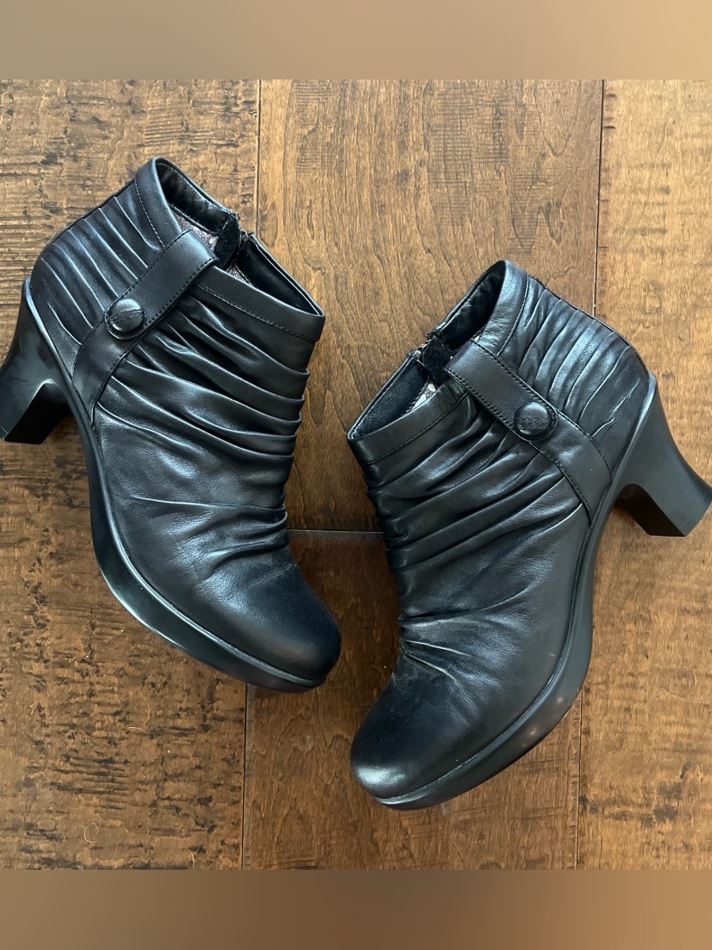 Dansko Buffy black leather ruched ankle booties with side button closure